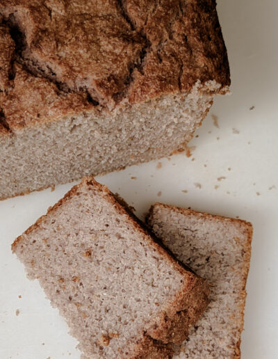 Home made cornbread loaf with two slices